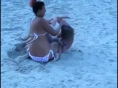 Girls fighting on the beach