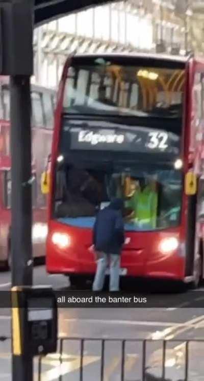 holding up traffic to get on a bus