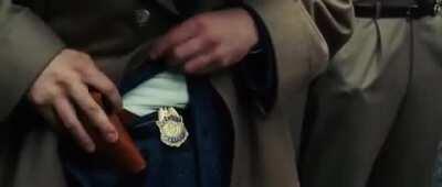 In Shutter Island (2010), Chuck struggles to remove his holster in the opening scene, suggesting he has his inexperience with handling fire arms.