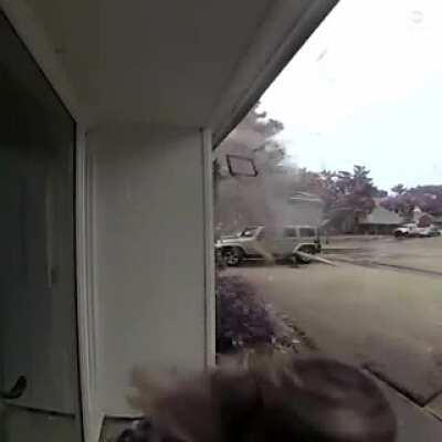 Right as this woman goes outside, lightening hits her neighborhoods home.