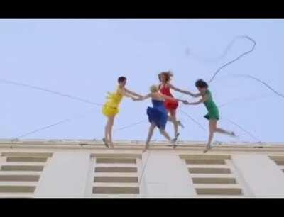 Dancing on top of a building