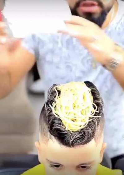 Eating spaghetti off a child’s head