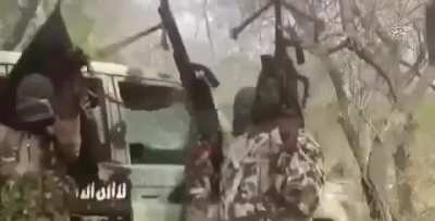 Abubakar Shekau; Leader of Boko Haram, firing at the sky for over a minute straight.