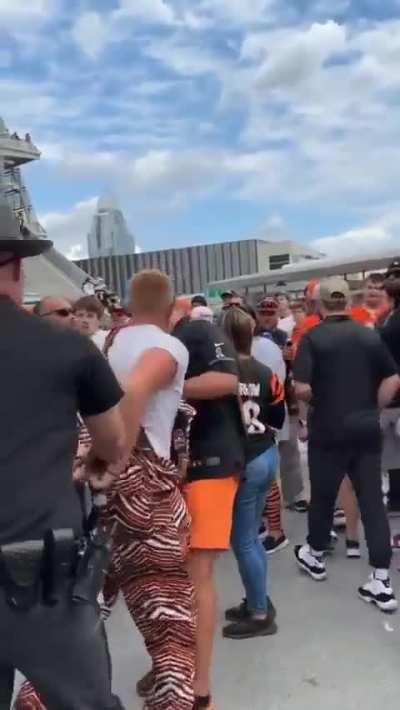 Fan headbutts another person.