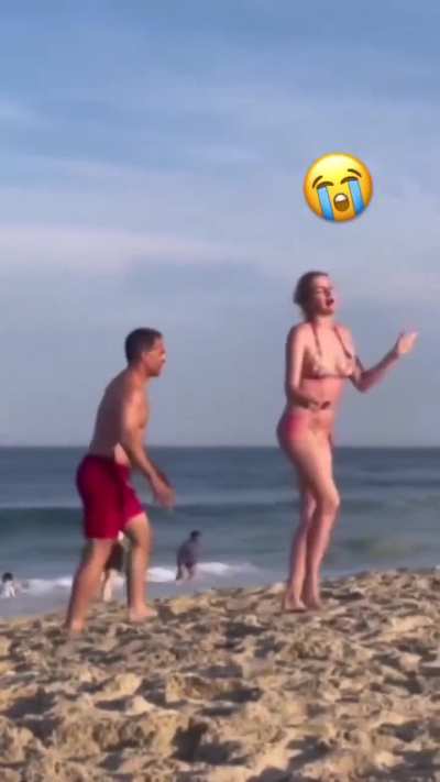 Weird couple making out in public beach