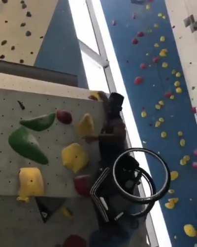 Impressive wall climb by dude on wheelchair