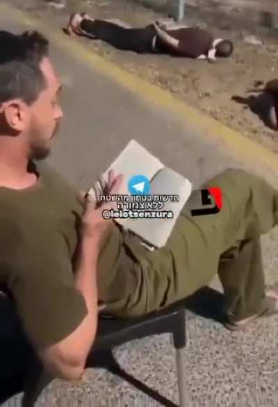 Leaked footage shows Israeli occupation soldiers torturing Palestinian detainees arrested from the occupied west bank, lying on the ground and on the stones. Meanwhile, an Israeli soldier seemingly reads the Jewish Torah book and provokes them.