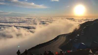 Cloud crashing into pikes peak in Colorado like waves in the ocean