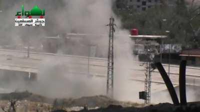 FSA anti-tank team successfully engages an SAA T-72 near the Al-Motahaleq Al-Janoubi Bridge on the outskirts of Damascus - 6/8/2013