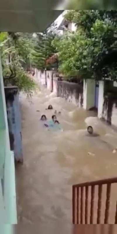 Some of them enjoying during the unexpected floods in Kerala(India).