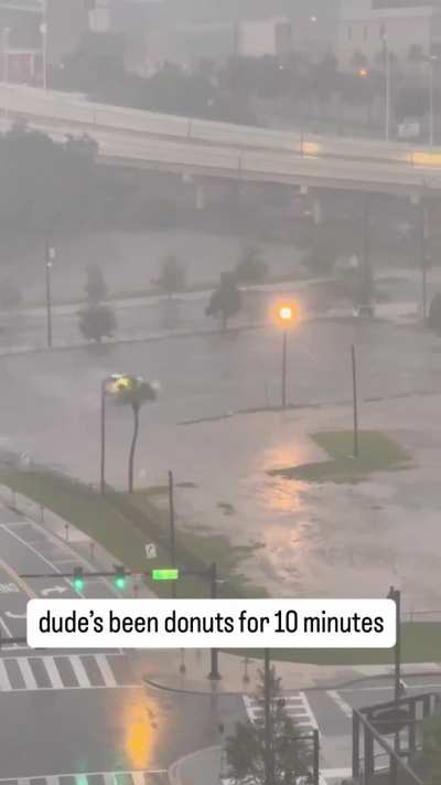 Dude doing donuts in downtown Tampa at the moment before Hurricane Milton hits