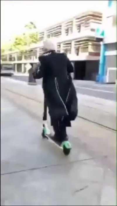 News Flash: A very motivated man found riding a scooter