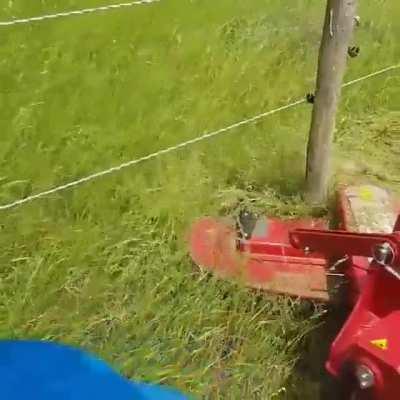 Mower that doesn't leave grass around posts