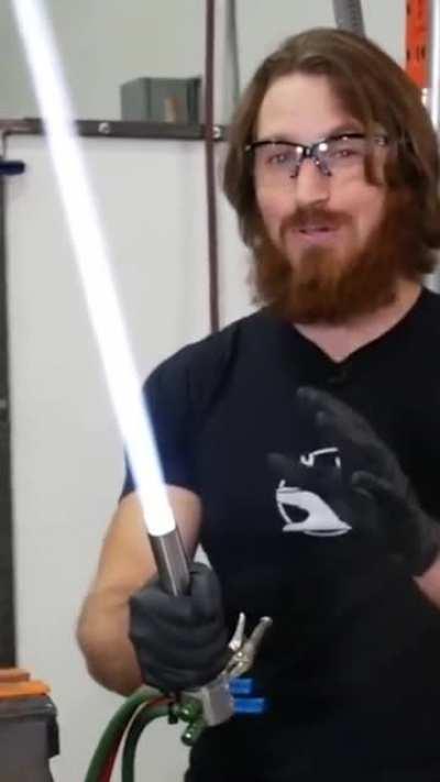 First retractable proto-lightsaber