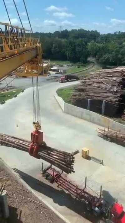 The huge amount of timber this crane can pick up straight of the truck