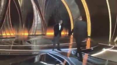 Will Smith just slapped Chris Rock at the Oscars