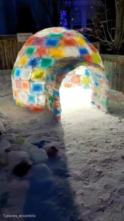 building a colorful igloo in the backyard