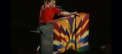 Paul McCartney does a racist stereotype then dabs on the crowd (2002)