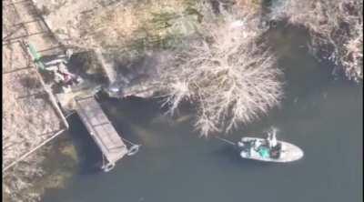 Drones attack Russian squad who then try to escape with wounded via boat only to be left on the dock (Kherson/date unknown)