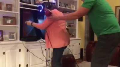 Mom completely freaks out playing VR horror game