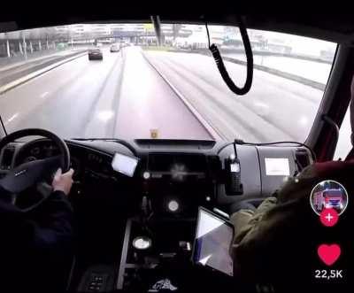 Driving a fire truck through Rotterdam, the Netherlands during rush hour