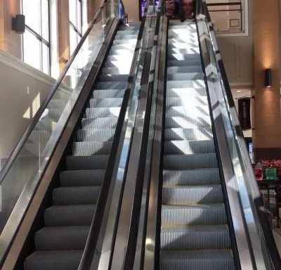 the shade as the escalators move up and down