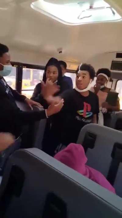 Students taunt their teacher off the bus.