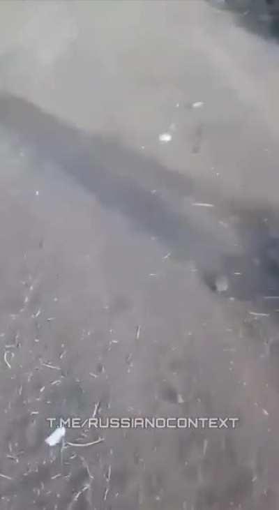 RU POV - Russian soldier takes a video and shows many friendly KIA and destroyed armor. He says 