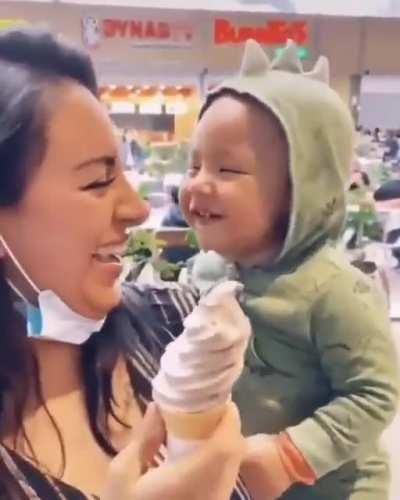 Baby enjoying eating icecream