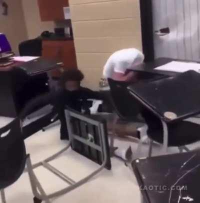 Students fighting in classroom