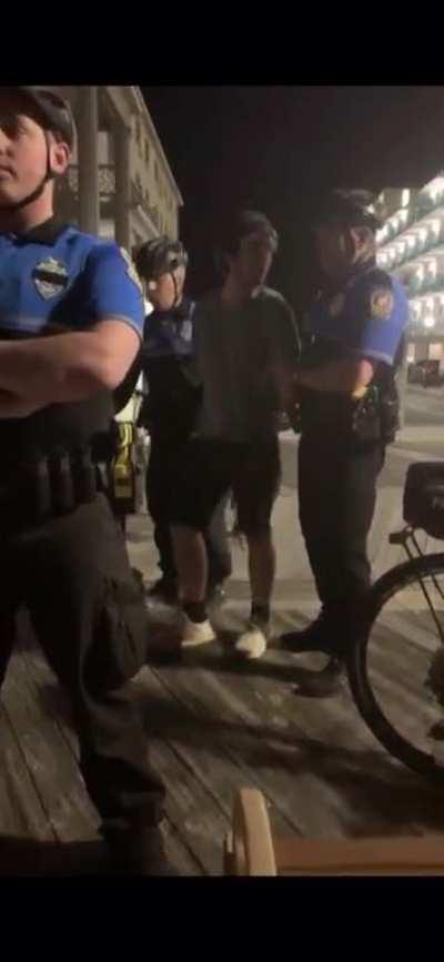 Ocean City, MD cop punches and chokes man for calling him names. His pals help him out and intimidate the guy recording the incident. OCPD are given a badge and gun after FOUR WEEKS of training.