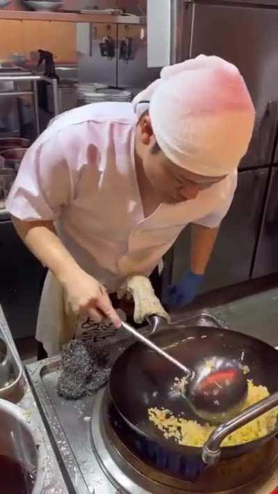 Japanese chef cooking fried rice