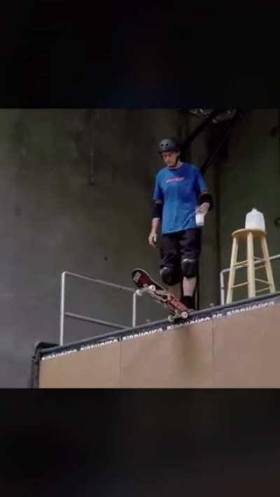 Tony Hawk does a McTwist while holding a glass of milk