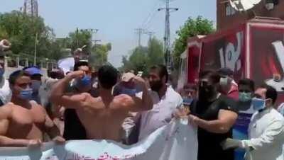 Gym owners and bodybuilders protest against closure of gyms outside Peshawar Press club.