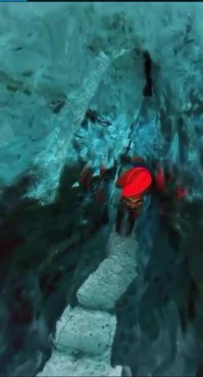 Waking through an ice cave on a glacier