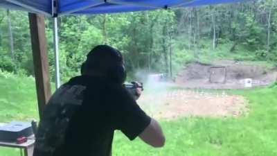 AK-47 muzzle blast deflecting rain