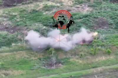 Russian soldier destroys an Ukrainian drone with a sack of potato