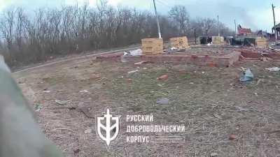 A fighter from the Russian Volunteer Corps ambushes a Russian IFV (00:14). Kozinka, Belgorod Oblast.