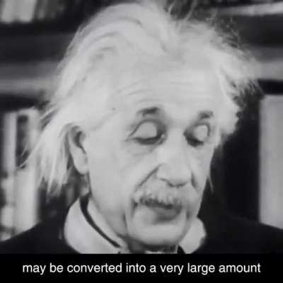 Einstein explaining his famous formula E = MC^2