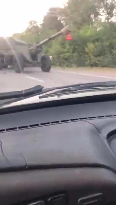 KamAZ truck with an old 1940s M-46 gun crushing a passenger car near Russian Novocherkassk