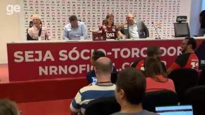 Journalist falls for porn noise prank during Filipe Luis’ Flamengo press conference.