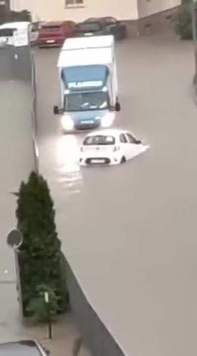 Driver turns their car into a boat, then back into a car