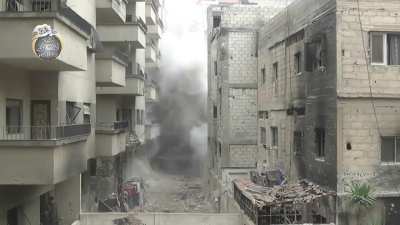 FSA camera set up to observe the movement of Syrian Army tanks catches claustrophobic fighting in Daraya - 12/10/2014