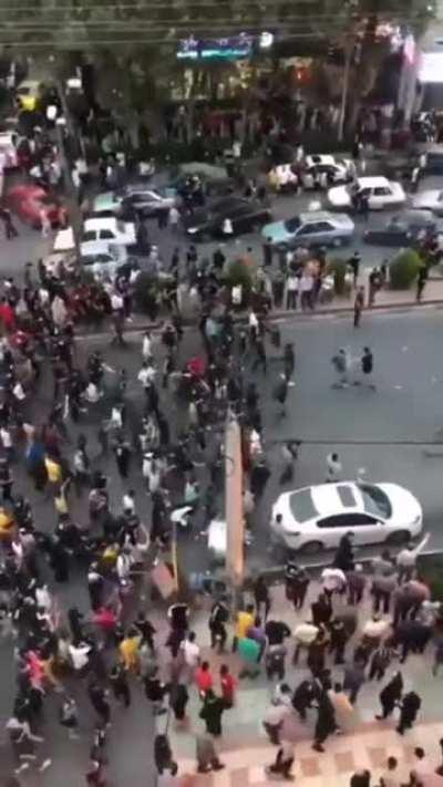 Iranian anti-government protesters scaring the security forces off.