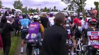 Spectator causes mass crash at the first stage of the Tour de France.