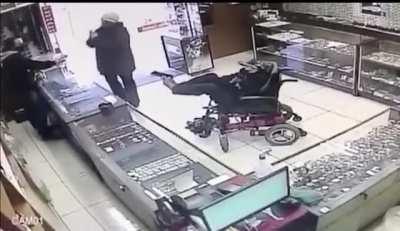 Paralysed deaf-mute teenager attempts to rob Brazil jewellery shop holding gun with his feet.