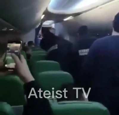 Passenger screams ‘Allahu akbar’ as he is dragged off Paris-Tunisia flight that was forced to divert when he was violent towards crew who stopped him praying by the cockpit