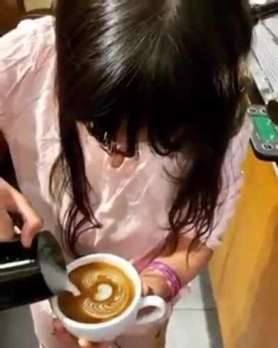 She is proud of her coffee art