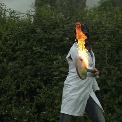 Slow Motion: Hitting a Tennis Ball on Fire