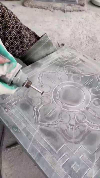 Decorating stone plate by hand